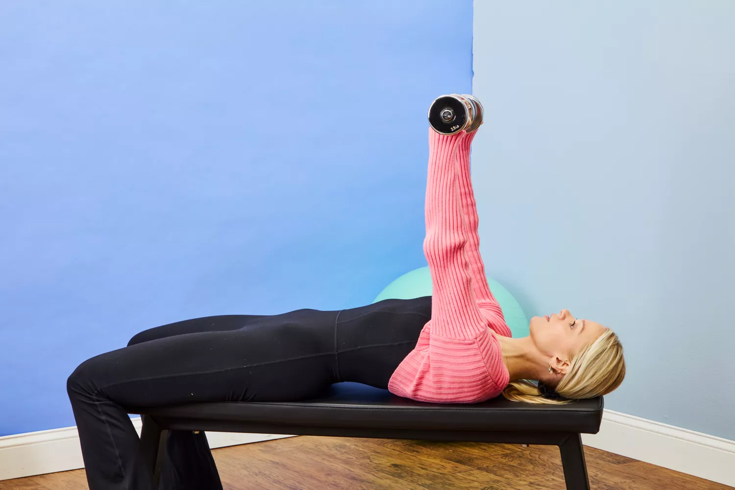 A person does chest presses while holding the Northdeer Steel Dumbbells Ultracompact & Adjustable Chrome Dumbbells