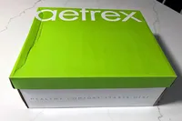 A green Aetrex Chase Arch Support Sneakers shoebox with the slogan 'Healthy Comfort Starts Here' on the side