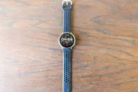 The Amazfit Active 2 Smartwatch on a wooden table