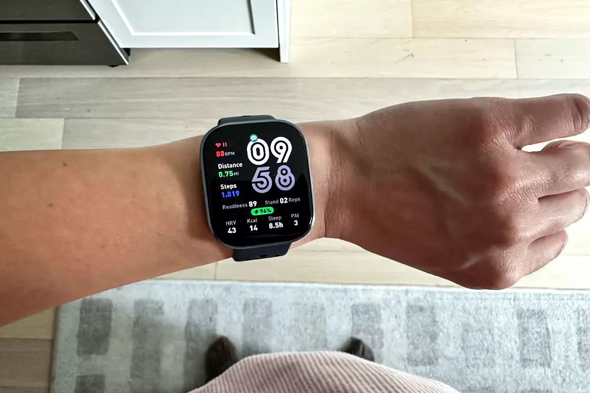 A person wears the Amazfit Bip 6 Smartwatch