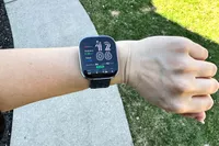 A person wears the Amazfit Bip 6 Smartwatch