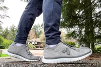 A close-up of a person's legs walking in the Anodyne No. 50 Men's Sport Trainers