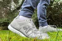 A close-up of the Anodyne No. 50 Men's Sport Trainers worn in grass