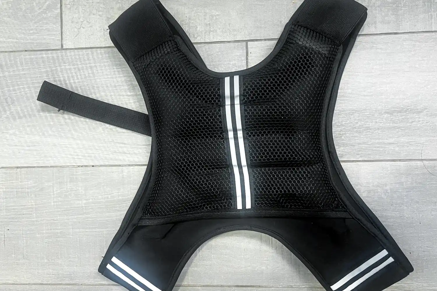 The reflective stripe on the APEXUP Weighted Vest