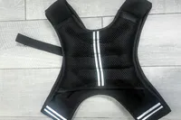 The reflective stripe on the APEXUP Weighted Vest