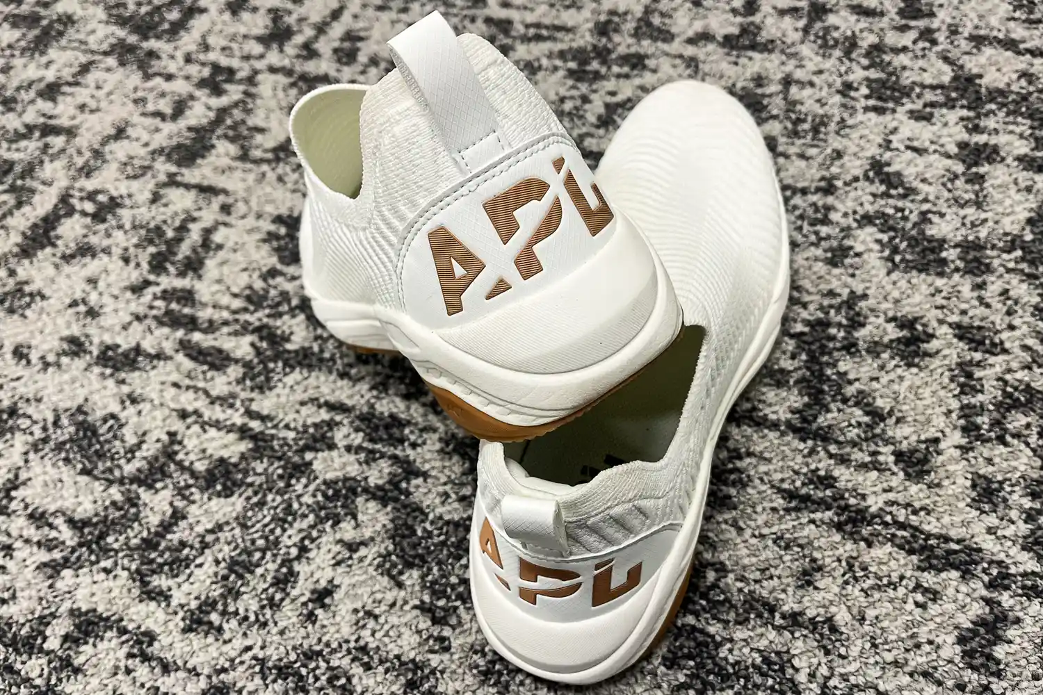 The APL Men's TechLoom Travelers on carpet