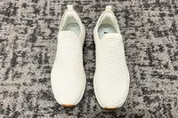 An overhead view of a pair of APL Men's TechLoom Travelers