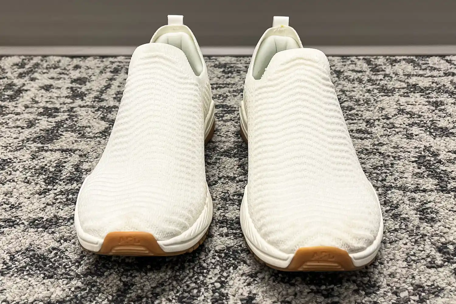 A front view of a person wearing the APL Men's TechLoom Travelers