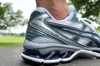 The name printed on the side of the Asics Men's Gel-Kayano 14 Sneakers