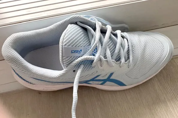 An overhead view of an untied Asics Women's Game FF Pickleball Shoe