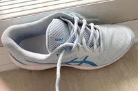 An overhead view of an untied Asics Women's Game FF Pickleball Shoe