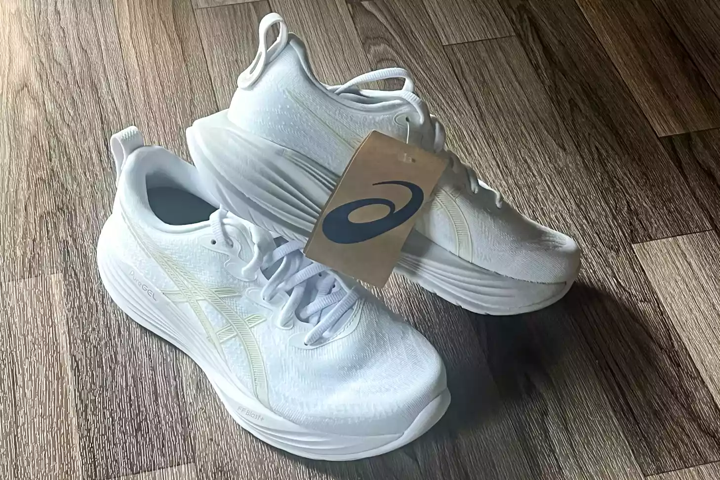 The Asics Women's Gel-Cumulus 27 Running Shoes with the tags on