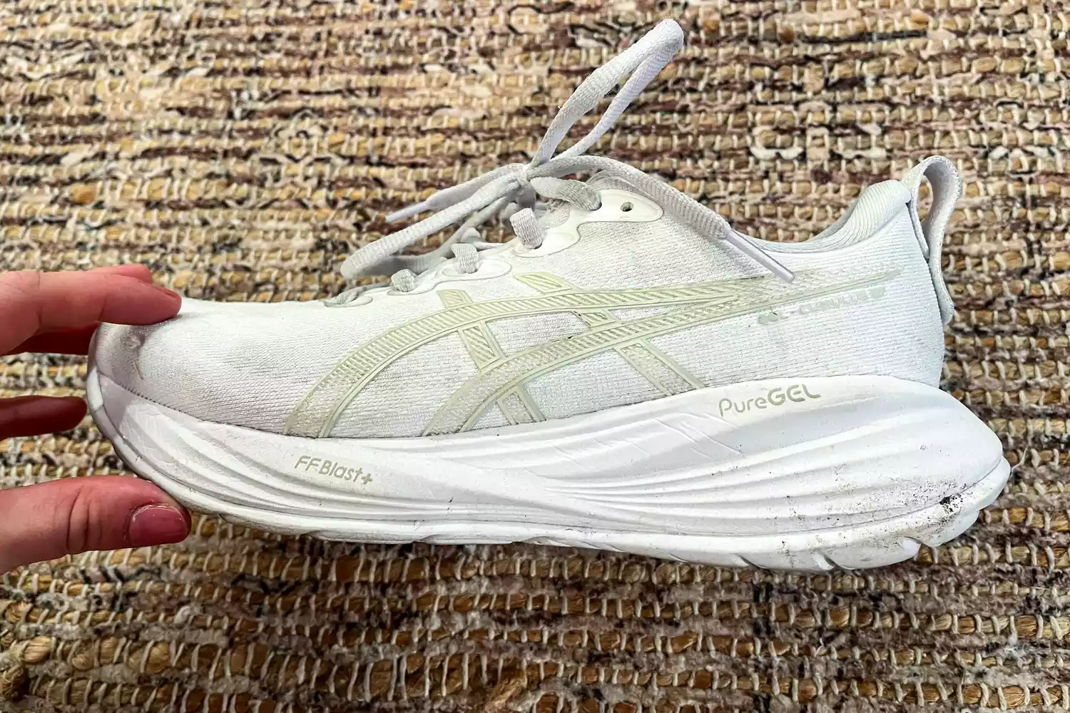 A side view of the Asics Women's Gel-Cumulus 27 Running Shoes