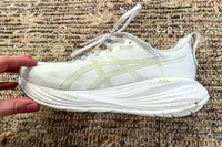 A side view of the Asics Women's Gel-Cumulus 27 Running Shoes