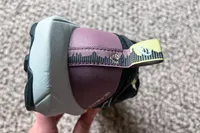 The tab on the back of the Asics Women's Gel-Trabuco 13 Trail Running Sneakers