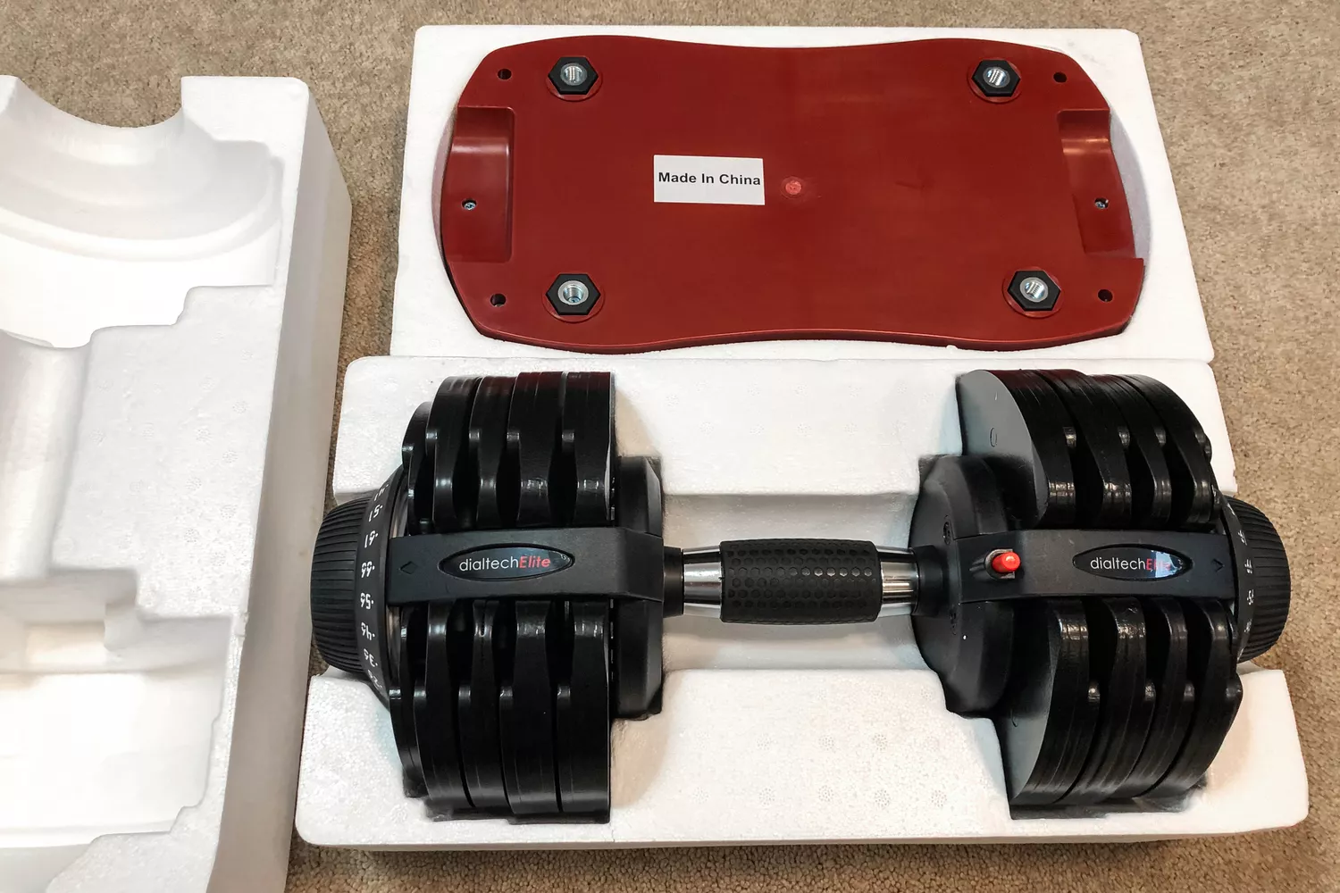 The Ativafit Adjustable Dumbbell Set inside packaging