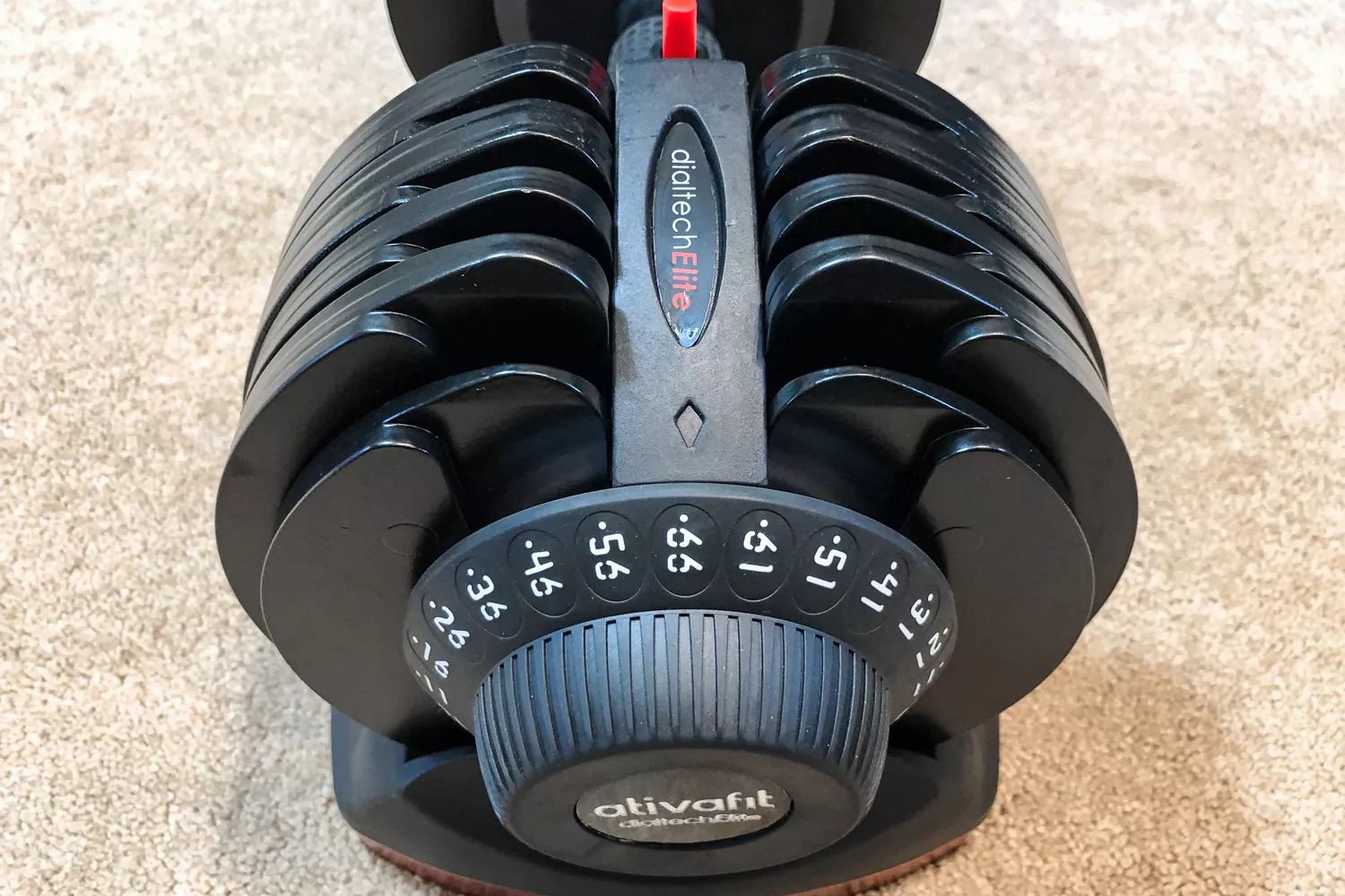 The dial on the side of the Ativafit Adjustable Dumbbell Set