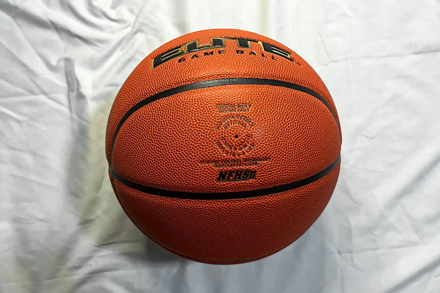 The Baden Elite Game Basketball on a white sheet