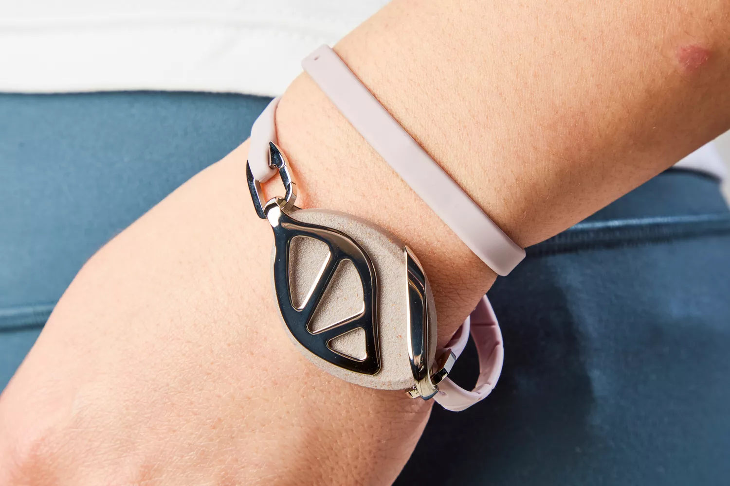 The Bellabeat Leaf Urban Smart Jewelry Health Tracker is worn on a person's wrist