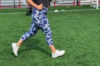 A person running while wearing Nike Womenâs Pegasus 40