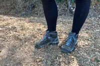Person wearing KEEN Targhee III Mid Waterproof Hiking Boots standing on a trail