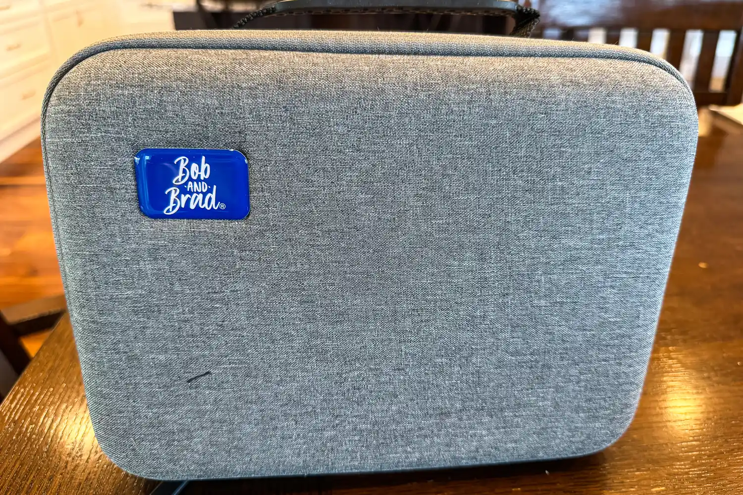 The brand name on a sticker on the Bob and Brad C2 Massage Gun storage case