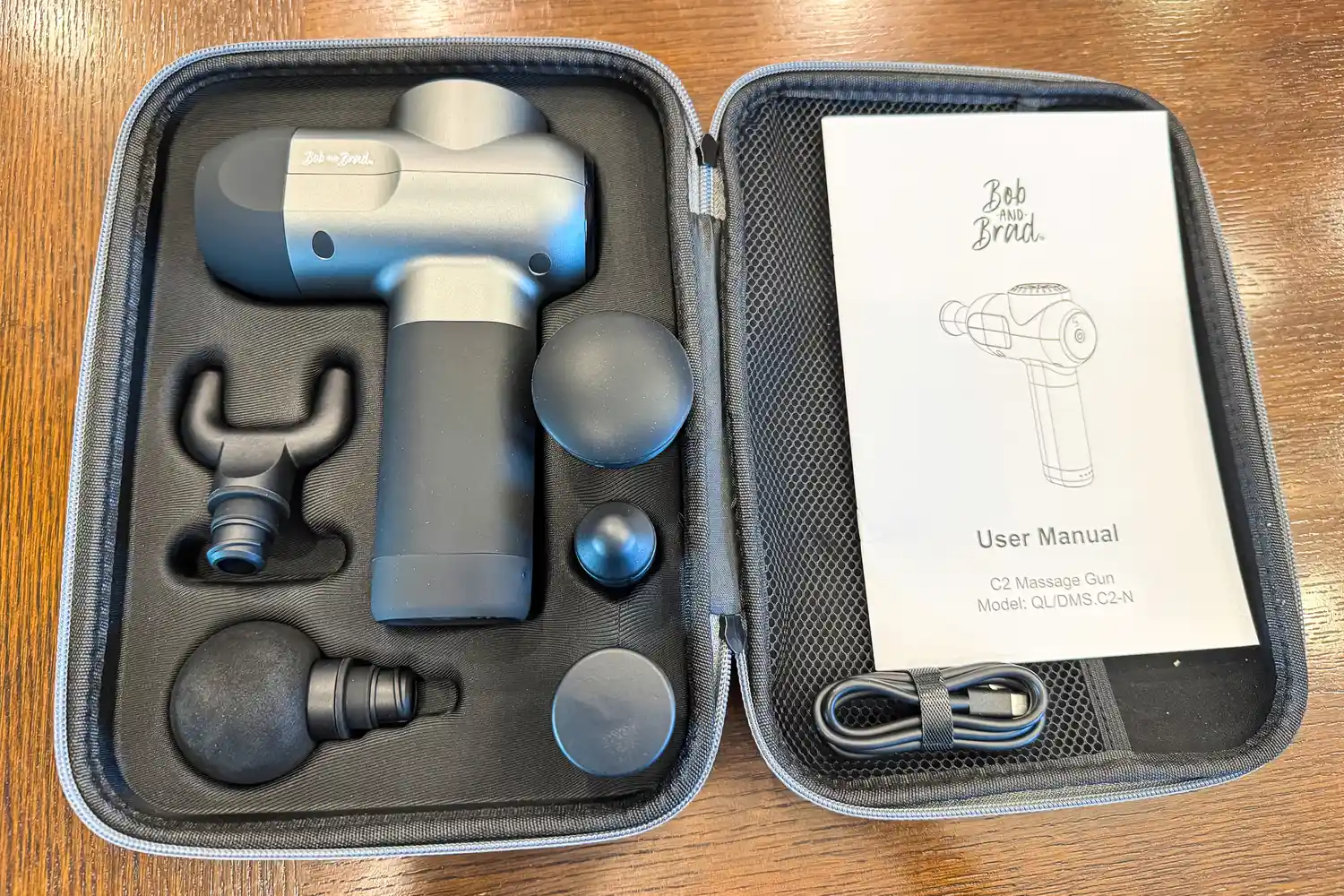 The Bob and Brad C2 Massage Gun inside a storage case