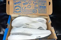 A pair of Brooks Men's Adrenaline GTS 24 Running Shoes in a shoebox