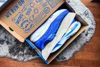 The Brooks Men's Adrenaline GTS 24 Road Running Shoes inside a shoebox