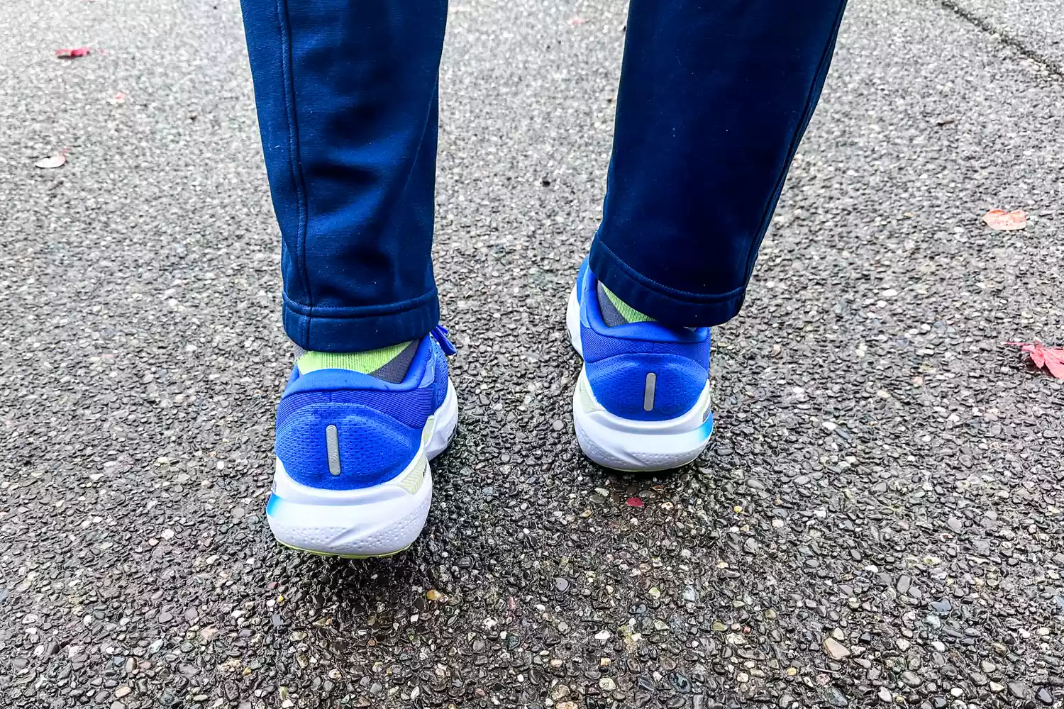 The back of a person wearing the Brooks Men's Adrenaline GTS 24 Road Running Shoes