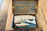 The Brooks Men's Trace 3 Road Running Shoes in a shoebox