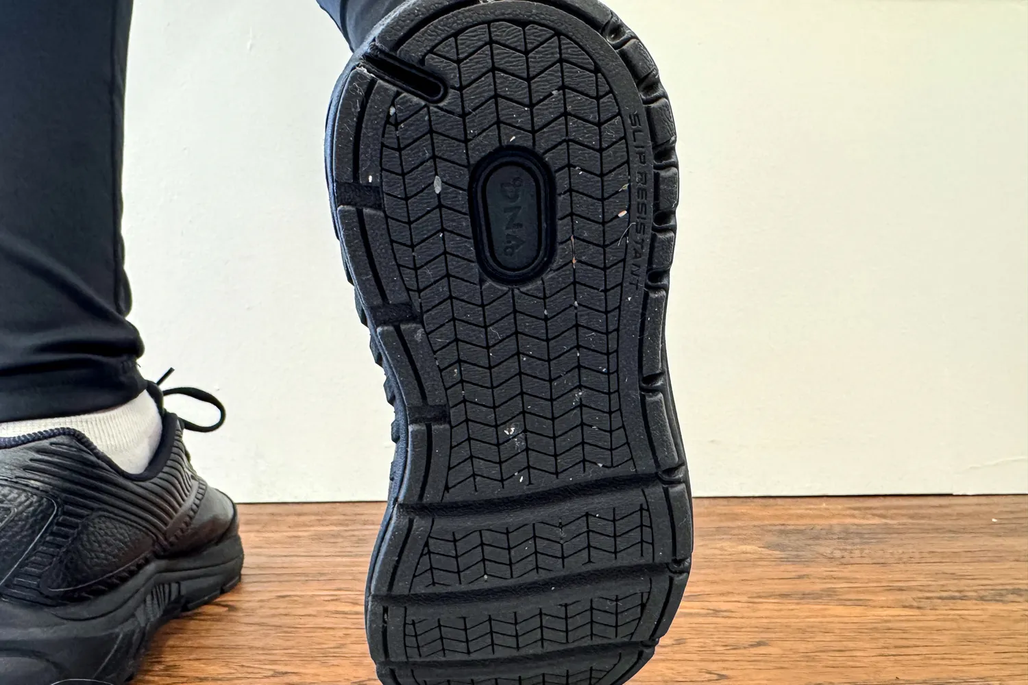 A close-up view of the Women's Addiction Walker 2 Sneakers sole showing its tread design and slip-resistant marking