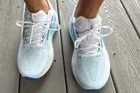 A front view of a person wearing Brooks Women's Glycerin GTS 22 Running Shoes