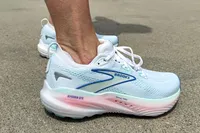 A side view of a person wearing the Brooks Women's Glycerin GTS 22 Running Shoes