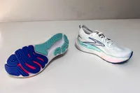 A pair of Brooks Women's Glycerin GTS 22 Running Shoes on a table