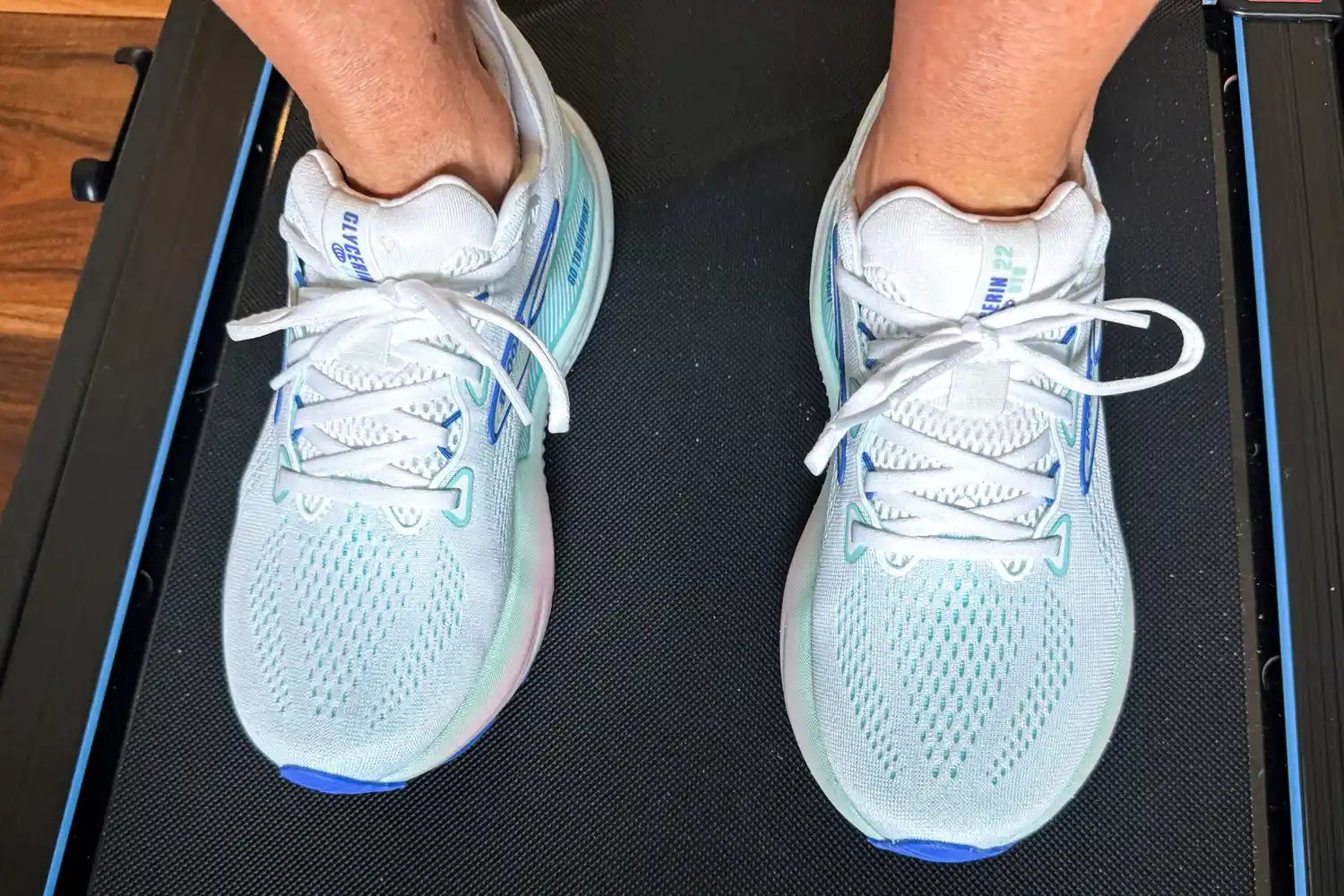 A person wearing Brooks Women's Glycerin GTS 22 Running Shoes on a treadmill