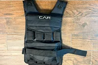 The CAP Barbell 20-150 Lb Adjustable Weighted Vest on a wooden floor