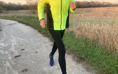 Person running outside wearing Rabbit Men's Pocket Tightz