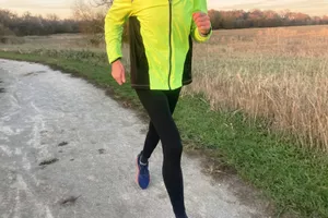 Person running outside wearing Rabbit Men's Pocket Tightz