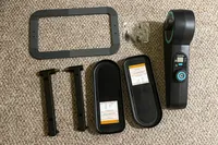 The parts of the Cubii Move Under Desk Elliptical Bike before assembly