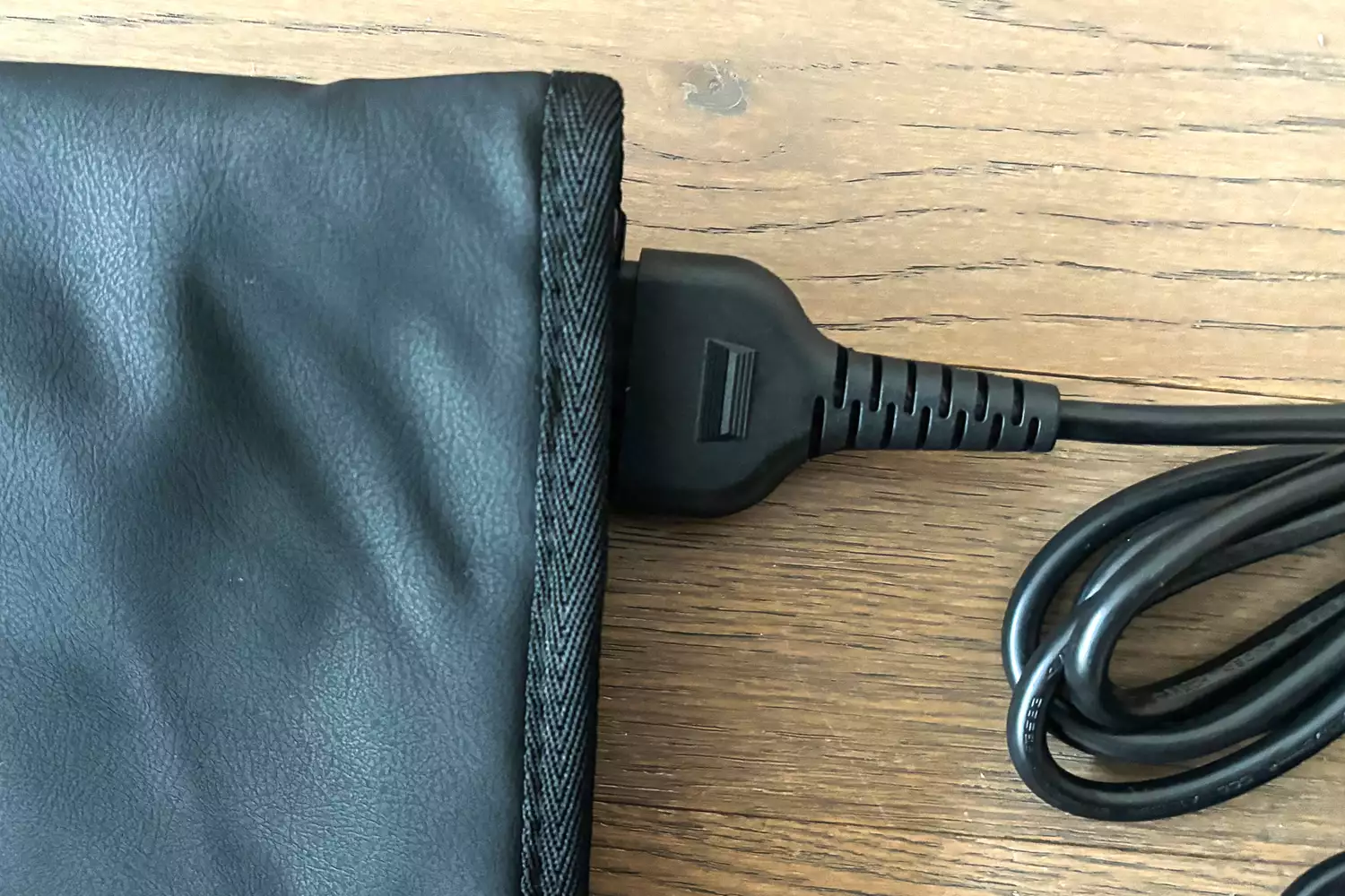 A close-up of the cord of the CurrentBody Skin Infrared Sauna Blanket