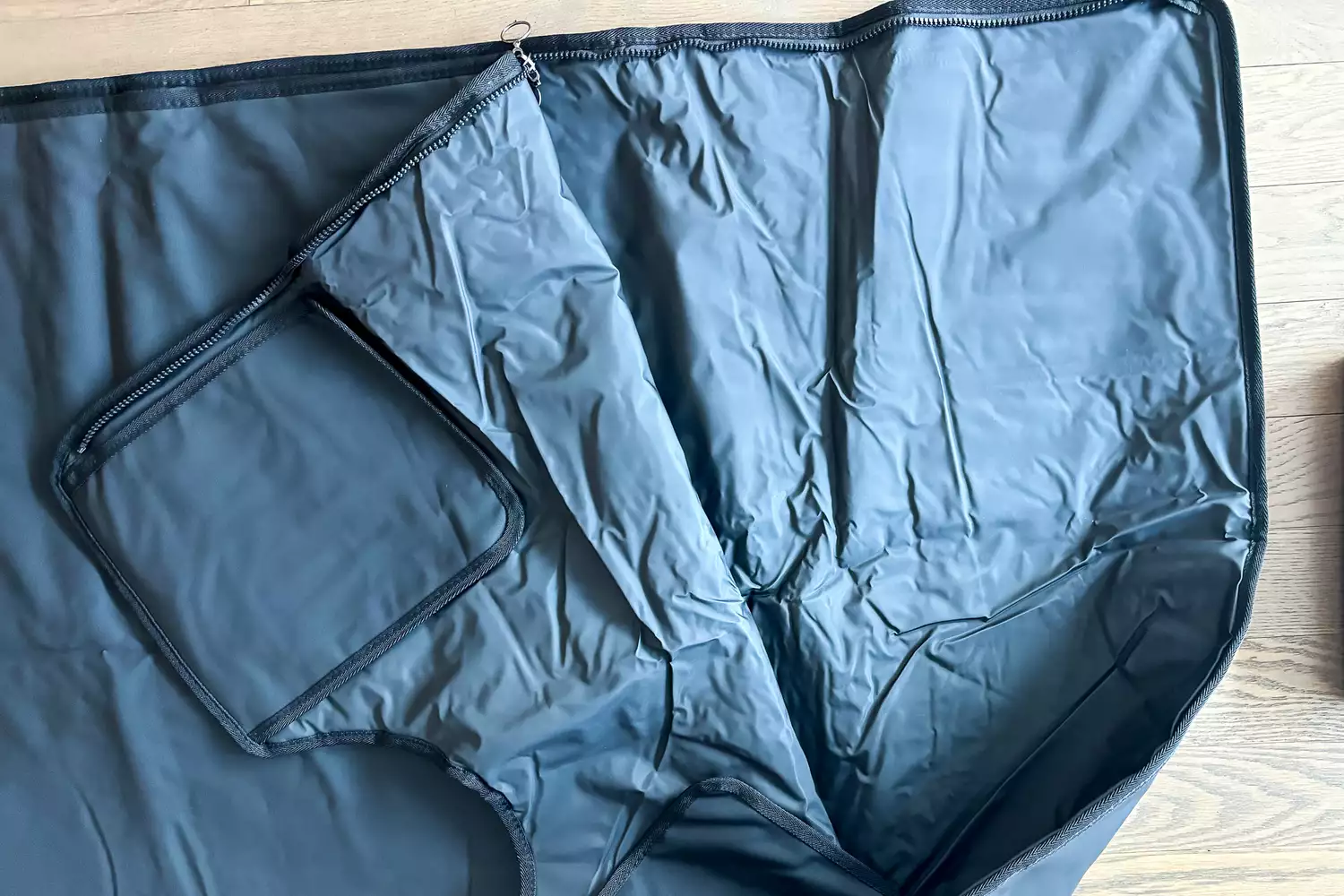 A close-up of a posed CurrentBody Skin Infrared Sauna Blanket showing the inside