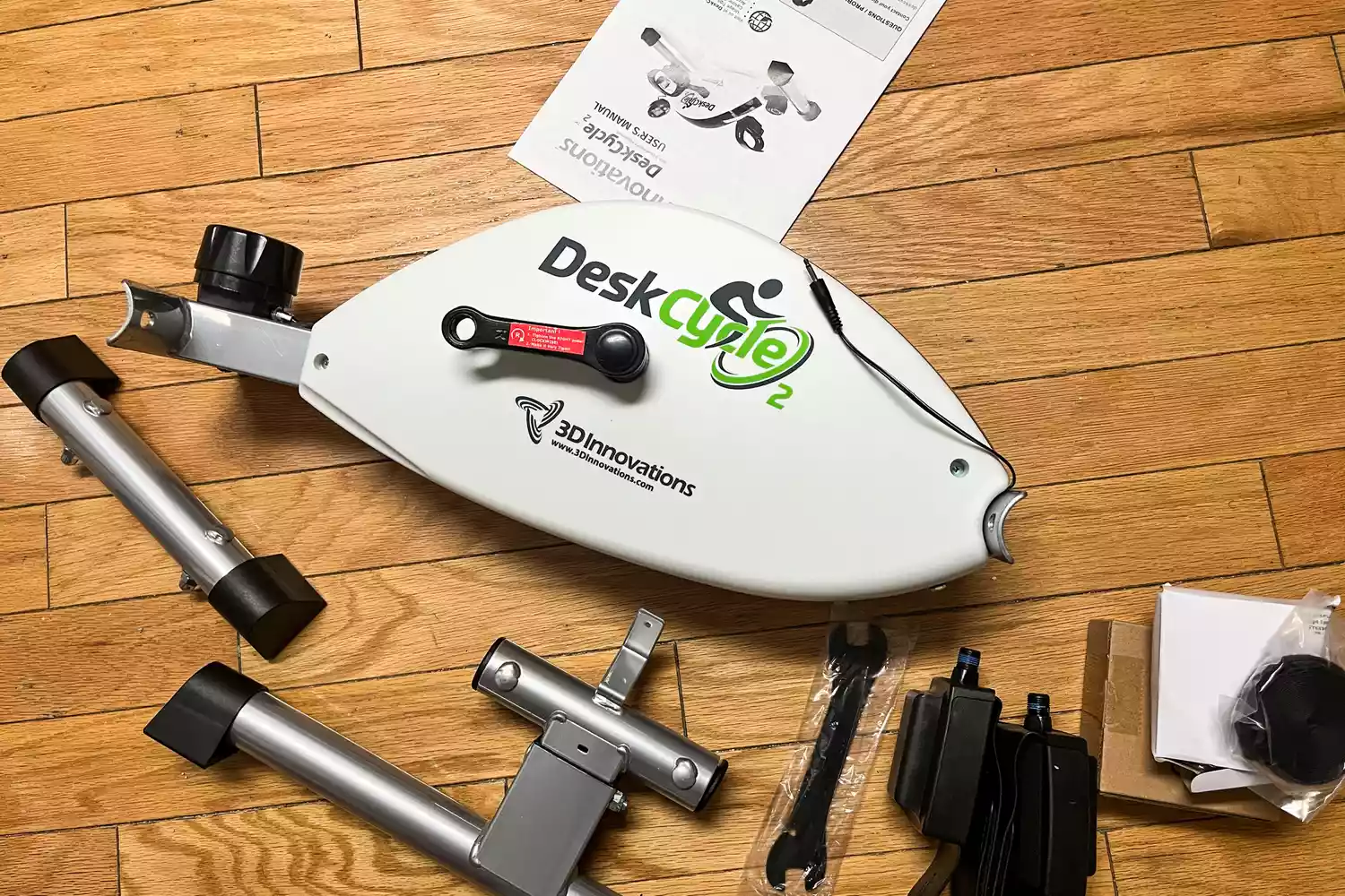 The pieces of the DeskCycle 2 Under Desk Bike Pedal Exerciser before assembly