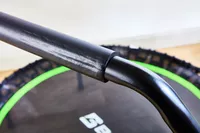 A close-up of the handle on the BCAN 450/550 Lbs Foldable Mini Trampoline