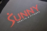The logo of the Sunny Health & Fitness 36 Inch Indoor & Outdoor Exercise Trampoline up-close