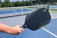 A person holds the Diadem A52 Pickleball Paddle