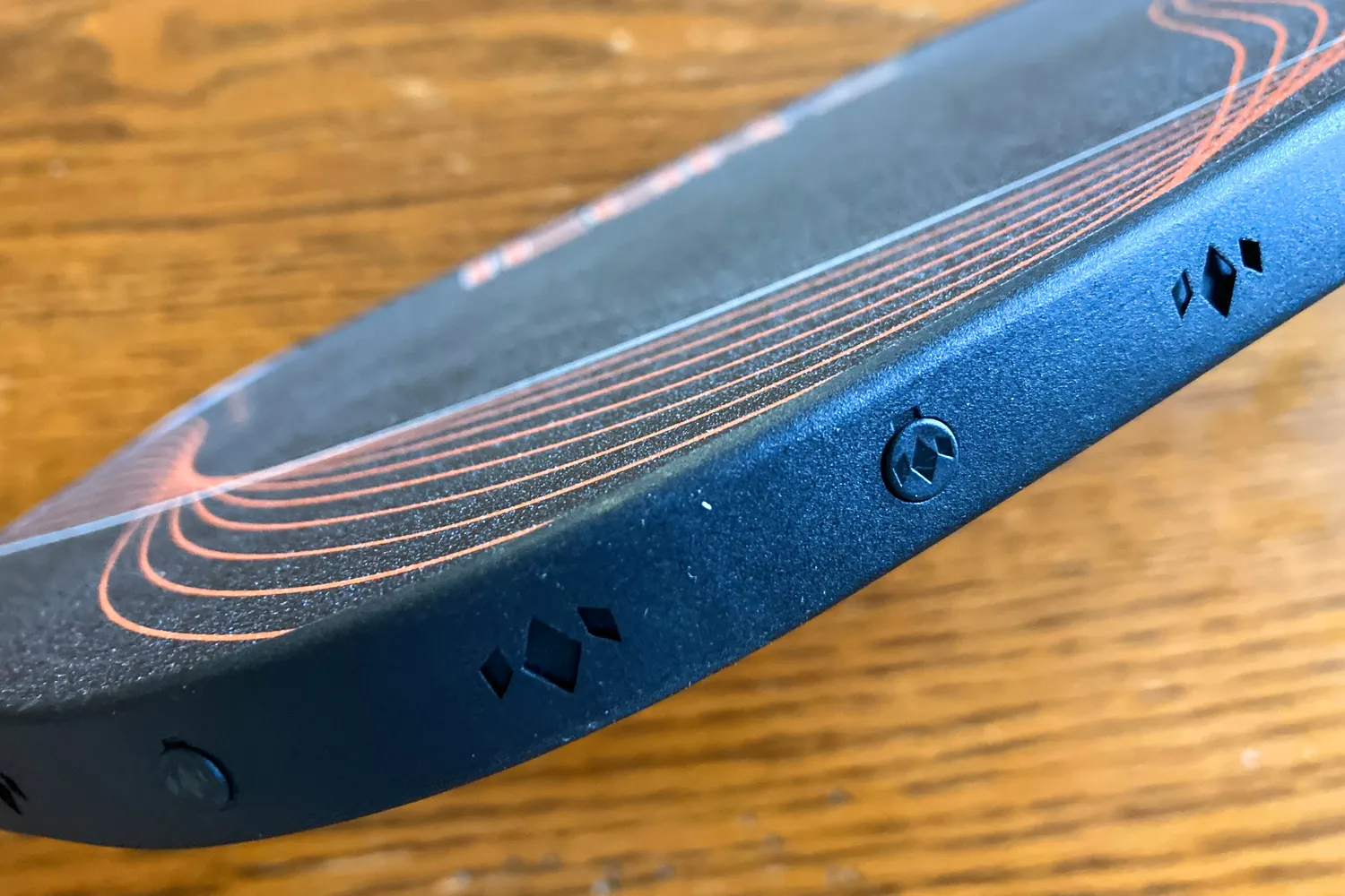 A side view showing the thickness of the Diadem Icon Infinity Pro Pickleball Paddle