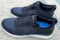 A side view of the Dr. Scholl's Men's Feel Ready Lace Up Sneakers