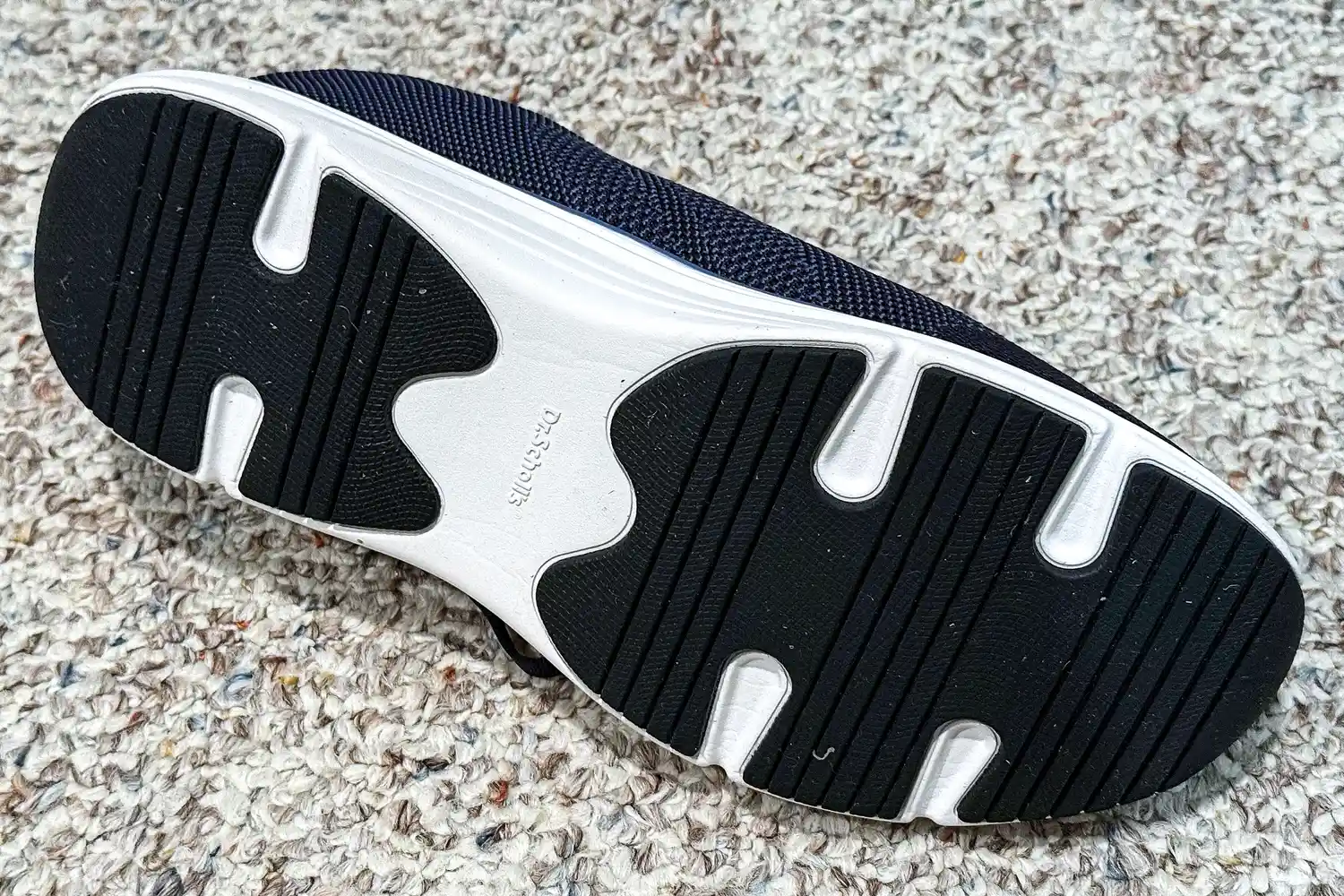 The tread design on the bottom of the Dr. Scholl's Men's Feel Ready Lace Up Sneaker