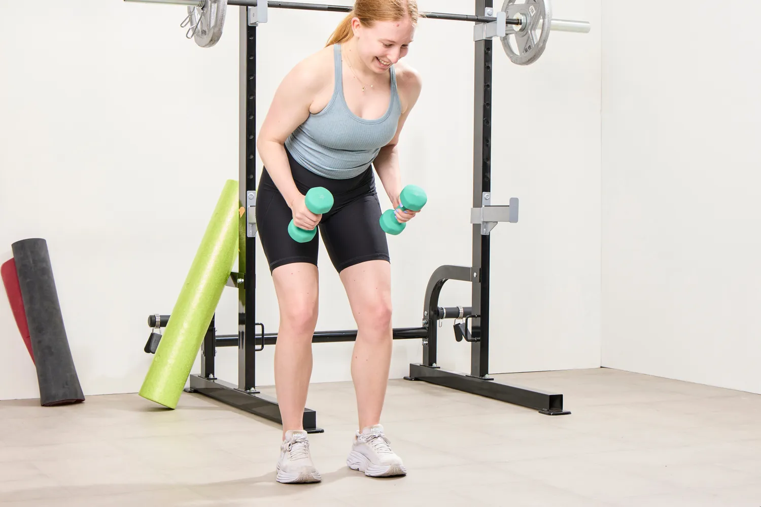A person exercises using the Yes4All Neoprene Coated Dumbbells